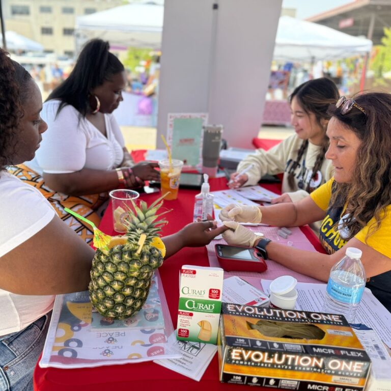 Meeting neighbors at the A2 African American Festival.